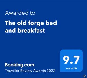 Ett certifikat, pris eller annat dokument som visas upp på The old forge bed and breakfast