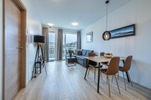TV a/nebo společenská místnost v ubytování Nortia Apartments