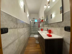 Koupelna v ubytování Nidi del faggio rosso - Family Holiday Home