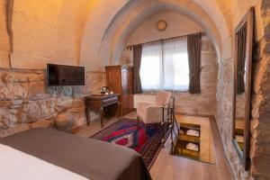 TV a/nebo společenská místnost v ubytování Maron Stone House