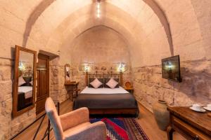 Postel nebo postele na pokoji v ubytování Maron Stone House