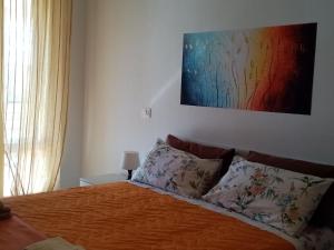 Postel nebo postele na pokoji v ubytování AFFITTACAMERE AQVA FONTIS