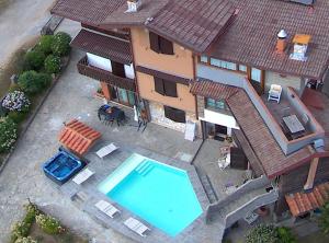 Bazén v ubytování Nidi del faggio rosso - Family Holiday Home nebo v jeho okolí