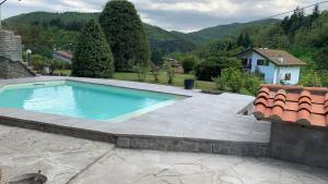 Bazén v ubytování Nidi del faggio rosso - Family Holiday Home nebo v jeho okolí
