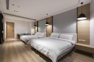 Letto o letti in una camera di 風起文旅 The Wind Rises