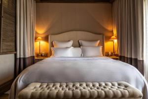 Кровать или кровати в номере Dom N16 by Ginza Hotels
