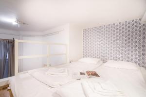Posteľ alebo postele v izbe v ubytovaní Colorwave Design Apartment