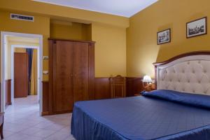 Posteľ alebo postele v izbe v ubytovaní Hotel San Michele