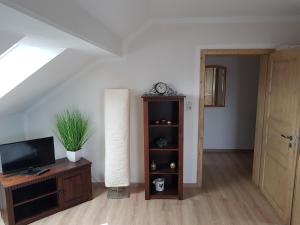 TV a/nebo společenská místnost v ubytování Ferienwohnung Weber Alpenglück