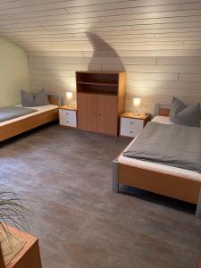 Llit o llits en una habitació de Buchenweg 39a