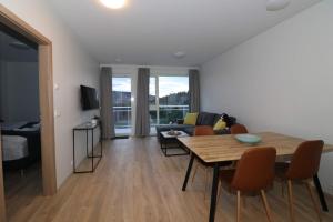 TV a/nebo společenská místnost v ubytování Nortia Apartments