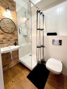 Kúpeľňa v ubytovaní LuxApart Kalisz Loft