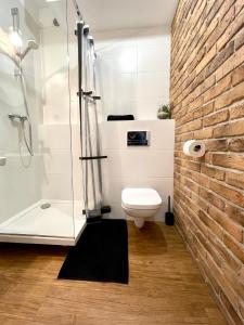 Kúpeľňa v ubytovaní LuxApart Kalisz Loft