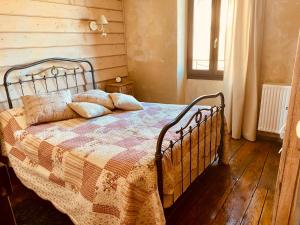 Postel nebo postele na pokoji v ubytování Gîte du Roc
