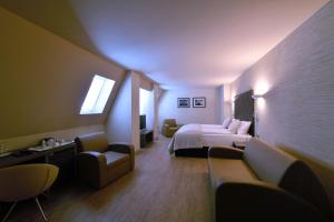Postel nebo postele na pokoji v ubytování Artim Hotel + 36 fotografií