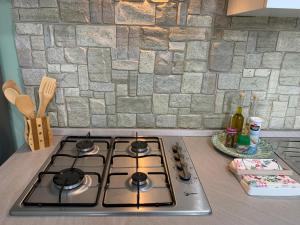 Kuchyňa alebo kuchynka v ubytovaní "L' Industrial Green" Apartment + 37 fotografií