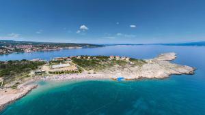 an aerial view of a small island in the water at Meliores Rooms in Šilo