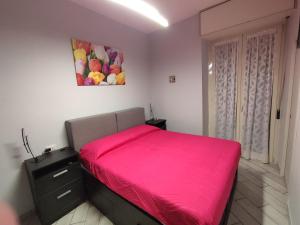 Posteľ alebo postele v izbe v ubytovaní Casa Vacanze Zia Rose