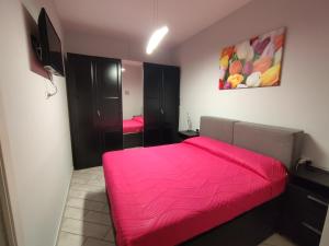 Posteľ alebo postele v izbe v ubytovaní Casa Vacanze Zia Rose