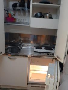Kuchyňa alebo kuchynka v ubytovaní Belmeloro Home