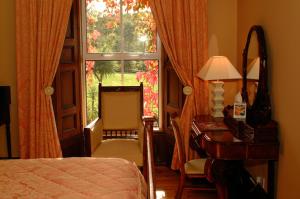 Voodi või voodid majutusasutuse Glendine Country House Wexford toas