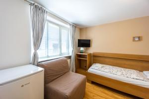 Posteľ alebo postele v izbe v ubytovaní Apartmány Podyjí