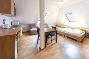 Posteľ alebo postele v izbe v ubytovaní Apartmány Podyjí