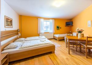 Posteľ alebo postele v izbe v ubytovaní Apartmány Podyjí