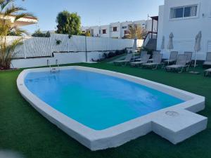 Bazén v ubytování New Miami Playa Apartamentos nebo v jeho okolí