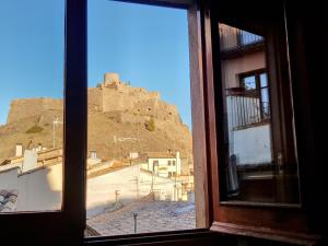 a view of a mountain from a window at Cardona Fira in Cardona