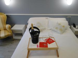 Postel nebo postele na pokoji v ubytování Hotel Moderno