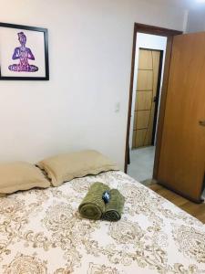 Tempat tidur dalam kamar di Vaccani Apart