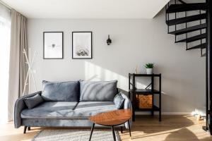 אזור ישיבה ב-Komfortowe OH Apartamenty Zator