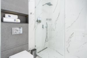 Kúpeľňa v ubytovaní EL Apartments - Castor + 16 fotografií