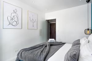 Posteľ alebo postele v izbe v ubytovaní EL Apartments - Castor