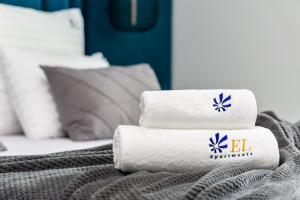 Posteľ alebo postele v izbe v ubytovaní EL Apartments - Castor