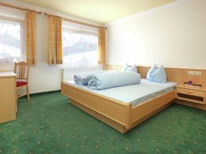 Ein Bett oder Betten in einem Zimmer der Unterkunft Modern Holiday Home in Maria Alm near Ski Area