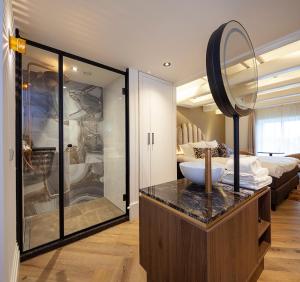 Ένα ή περισσότερα κρεβάτια σε δωμάτιο στο Boutique Hotel Jersey