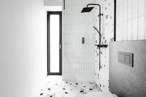 חדר רחצה ב-Komfortowe OH Apartamenty Zator