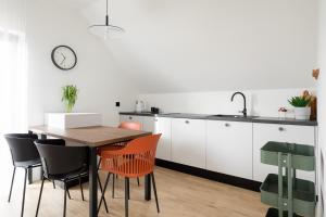 מטבח או מטבחון ב-Komfortowe OH Apartamenty Zator