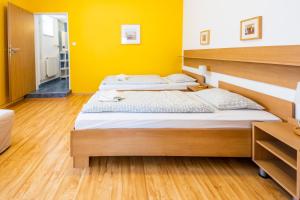 Posteľ alebo postele v izbe v ubytovaní Apartmány Podyjí