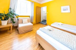 Posteľ alebo postele v izbe v ubytovaní Apartmány Podyjí