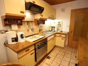 Kuchyň nebo kuchyňský kout v ubytování Apartment in Liebetig near Gerlitzen Ski Area
