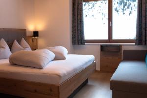 Posteľ alebo postele v izbe v ubytovaní Mountain Lodge
