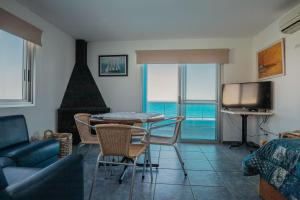 Χώρος καθιστικού στο Apart Hotel Punta Azul