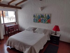 Postel nebo postele na pokoji v ubytování Casa Turística Camitas Inn