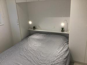 Postel nebo postele na pokoji v ubytování Appartement Biaritz