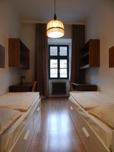 Postel nebo postele na pokoji v ubytování DORMitory