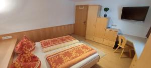 TV a/nebo společenská místnost v ubytování Apart Mia