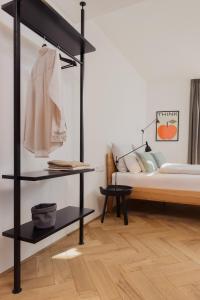 Postel nebo postele na pokoji v ubytování Marktbar Studios - Boutique Aparthotel